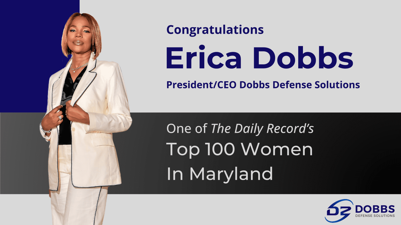 Award recognition for woman in white suit.