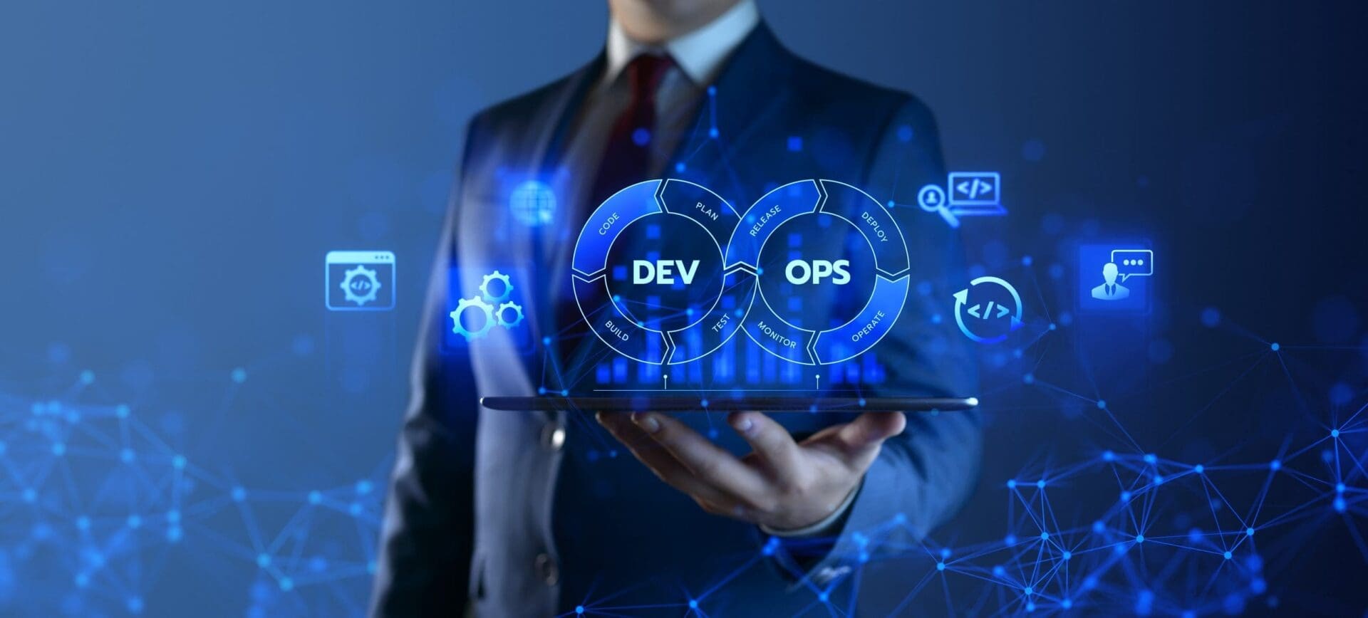 Businessman holding a digital representation of DevOps integration.