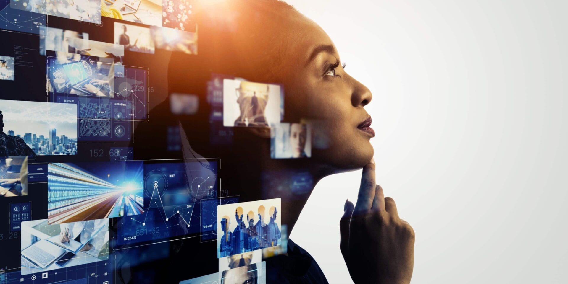 Thoughtful woman surrounded by digital images and data visuals.
